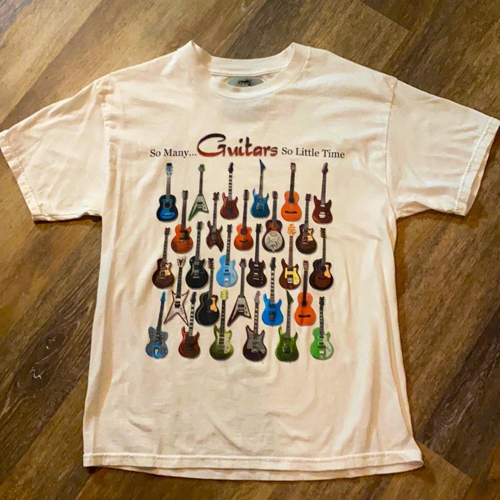 For the guitar 🎸 enthusiasts. 100% cotton large t-shirt.